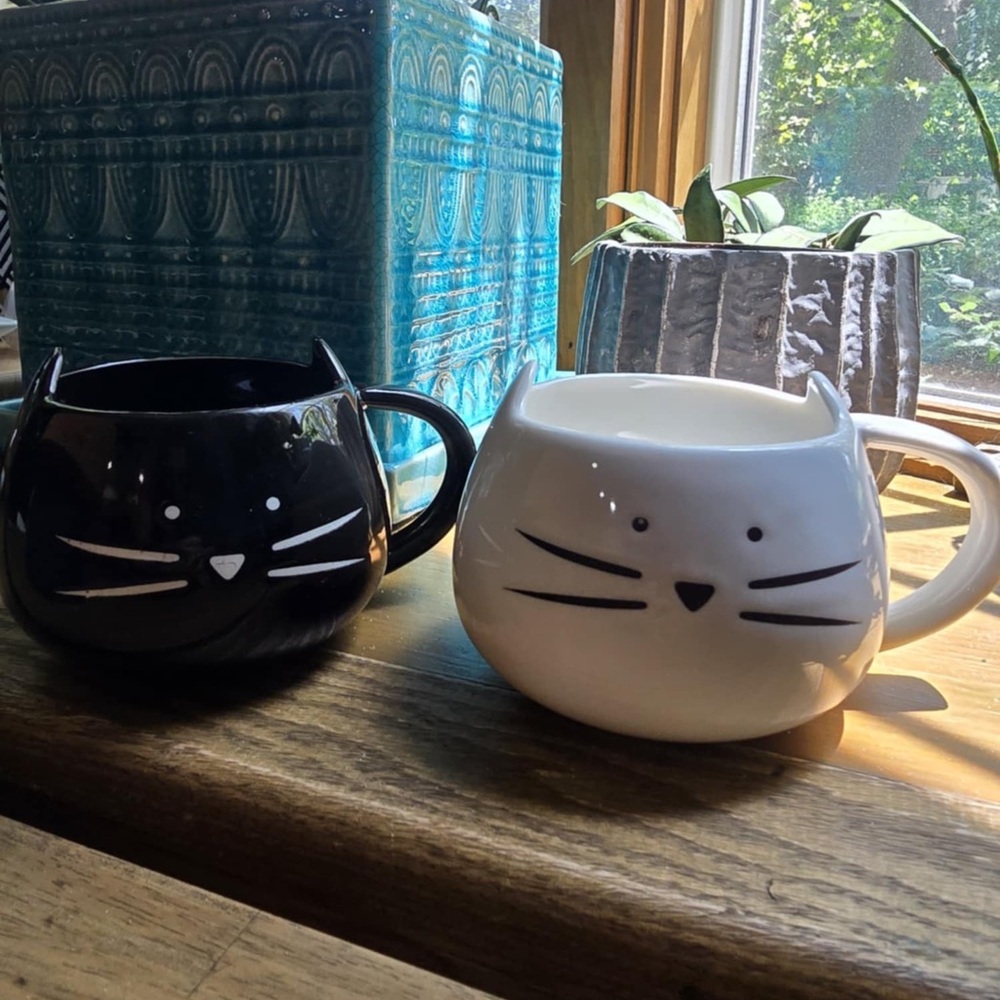 Cat-Shaped Black and White Mugs
